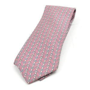 A silk tie by Hermes, styled with a blue and white Chaine&hellip;