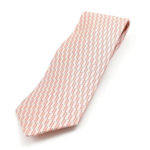 A silk tie by Hermes, styled with an 'H' design on a dusty pink&hellip;