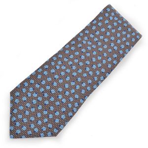 A silk tie by Hermes, styled with blue ladybirds on a chocolate&hellip;