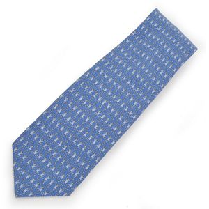 A silk tie by Hermes, styled with monkeys on a dusty blue&hellip;
