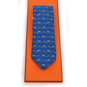 A silk tie by Hermes, styled with a whimsical horse design on a&hellip;
