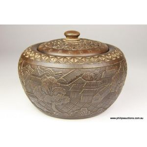 A Chinese earthenware tea caddy, 20th century, the double…