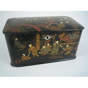 A Victorian Chinoiserie ebonized and gilt tea caddy.…