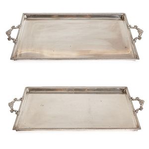 A pair of Wiskemann silver-plated trays, Arabesque-shaped…