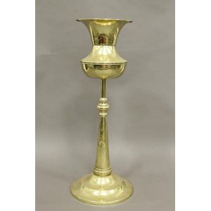 A brass floor standing ship's spittoon with tapered pedestal…