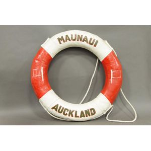 A vintage ship's painted canvas and cork life preserver for the…