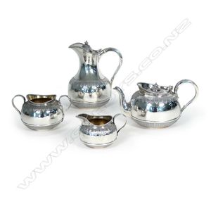 A Victorian silver four-piece tea service, the spherical bodies…