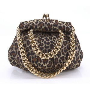 A Yoyo evening bag by Christian Louboutin, styled in metallic&hellip;