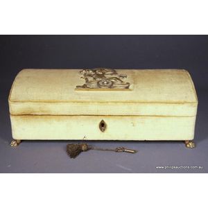 A velvet and brass jewellery box, the gold velvet covered low…