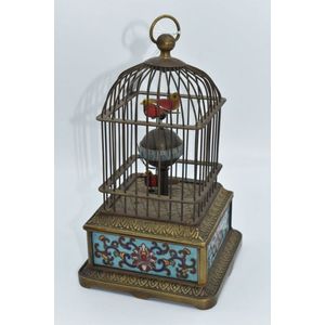 A vintage French champleve cage bird clock (working)