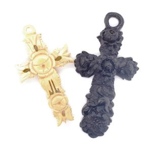 Two antique crosses includes an ivory and a gutta percha piece,…