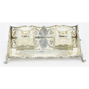A sterling silver standish, well decorated with foliate…