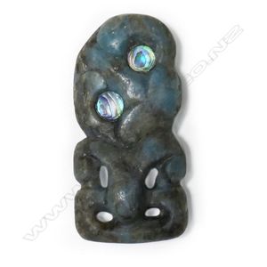 A very small pounamu hei tiki, of unusual blue toned stone,…