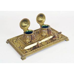 A French Louis XV bronze rococo inkstand with an elevated pen…