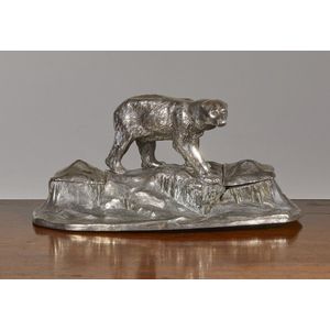 A silverplated inkstand, in the form of an ice floe with a…