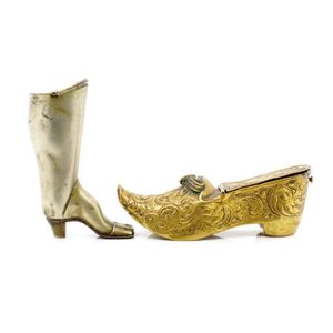 Two antique novelty vesta cases includes a brass slipper and a…