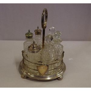 Silver plated cruet set with crystal bottles, EPNS stand and…