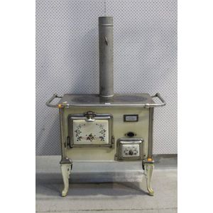 Antique French polished iron and enamel stove, approx 79 cm…