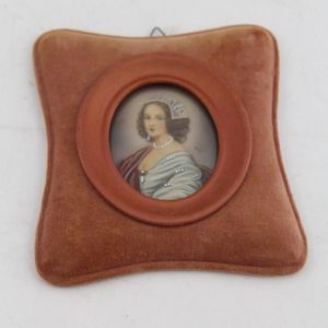 A framed, possibly ivory, miniature of an 18th century…