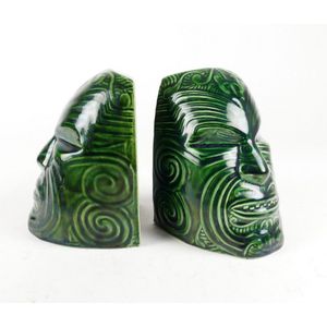 A pair of Crown Lynn Wharetana Maori Art 'Moko' book-ends,…