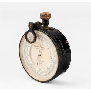 An Australian military issue metal cased surveying aneroid…