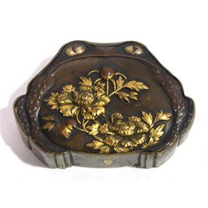 A fine bronze & gilt frog shaped covered box, painted in gold &…
