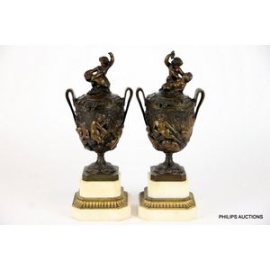 A pair of French covered bronze urns, 19th century, well cast…