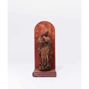 A carved giltwood figure of the Virgin and child, central…