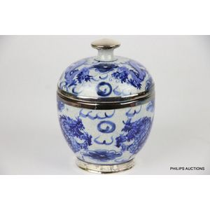 A blue and white crackleware covered jar with sterling silver…