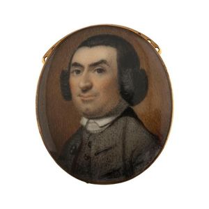 An English 18th century miniature portrait of a gent painted on…