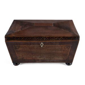 A Georgian tea caddy, mahogany and walnut with whalebone…