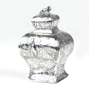 An early 20th century ornate German silver embossed tea caddy,…