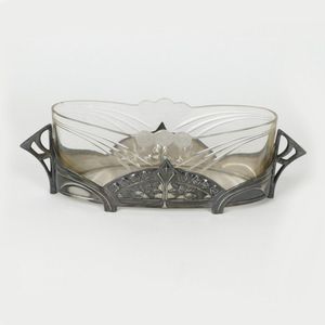A WMF silver plate and glass bowl, the oval frame decorated…