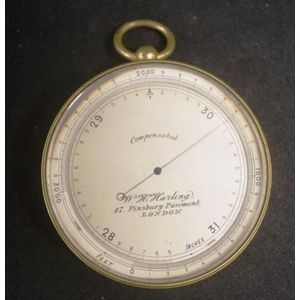 Vintage brass cased barometer marked to dial for W.H. Harling,…