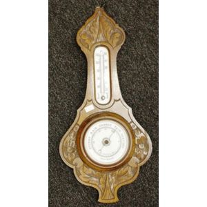 Vintage carved oak barometer with thermometer above, and…