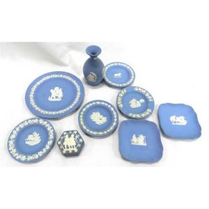 Seven Wedgwood Jasperware blue & white pin dishes, a vase &…