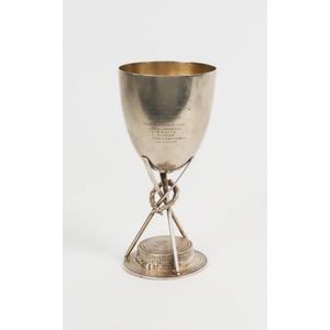 Rowing: Silver-plated trophy with cup supported by three oars…