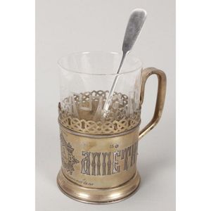 19th century Russian silver tea cup holder and spoon, set with…