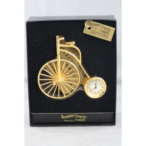Waterbury clock Co. Bedside clock, in the form of a penny…