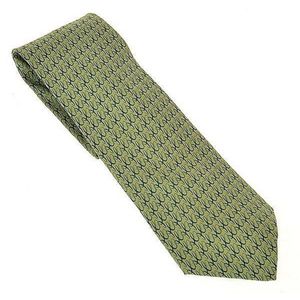 A silk tie by Hermes, styled with forest green swirls on a&hellip;