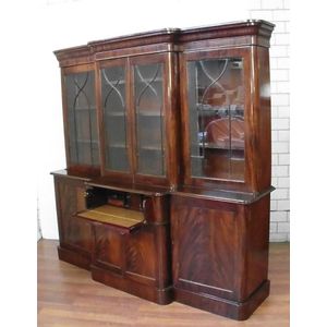 A Victorian mahogany four door breakfront secretaire bookcase.&hellip;