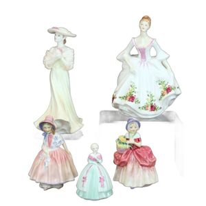A group of Coalport and Royal Doulton figurines, comprising a&hellip;