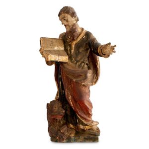 An antique German carved and polychrome wood figure of St mark…