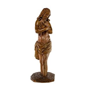 A finely carved and polychrome painted figure of the Baptimism…