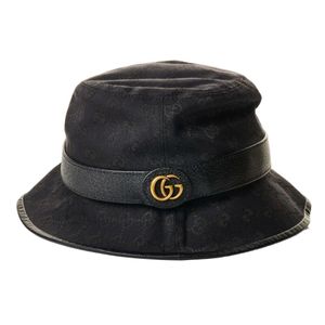 Gucci black canvas GG wide brim hat. Made in Italy. Features a&hellip;
