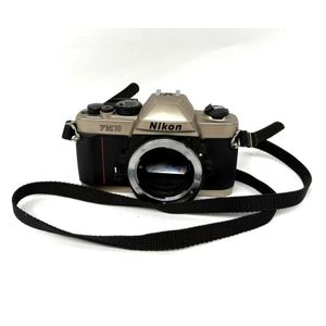 A vintage Nikon FM10 35 mm manual Focus SLR film camera, no lens