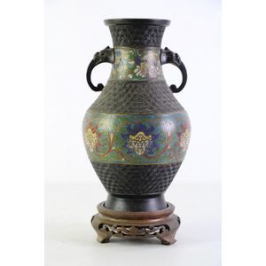 A twin handled cloisonne inserted vase on timber stand, total…