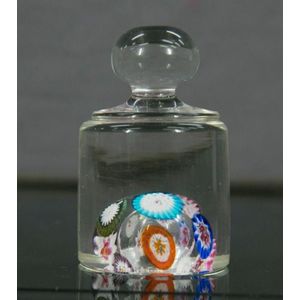 Millefiori & clear glass paperweight. Open bubble to base.…