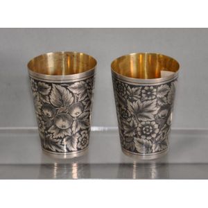 Two Russian Niello silver shot tumblers stamped to base, with…