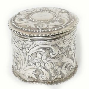 A Victorian silver dressing table box, cylindrical, foliate…